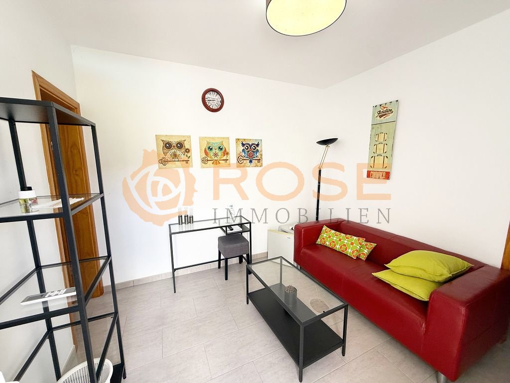 Bright study with practical layout and optimal ceiling lighting