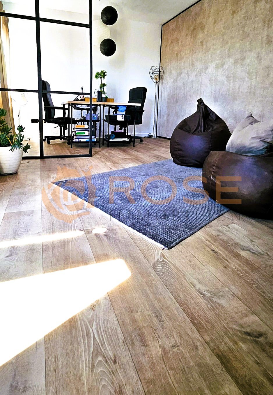 Open living area with flexible zoning and high-quality flooring