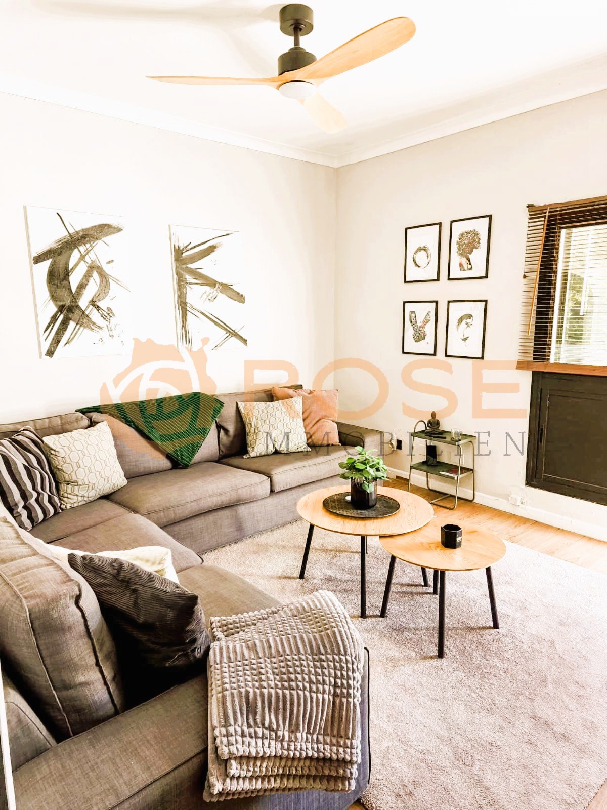 Living area with high ceilings and modern ceiling ventilation