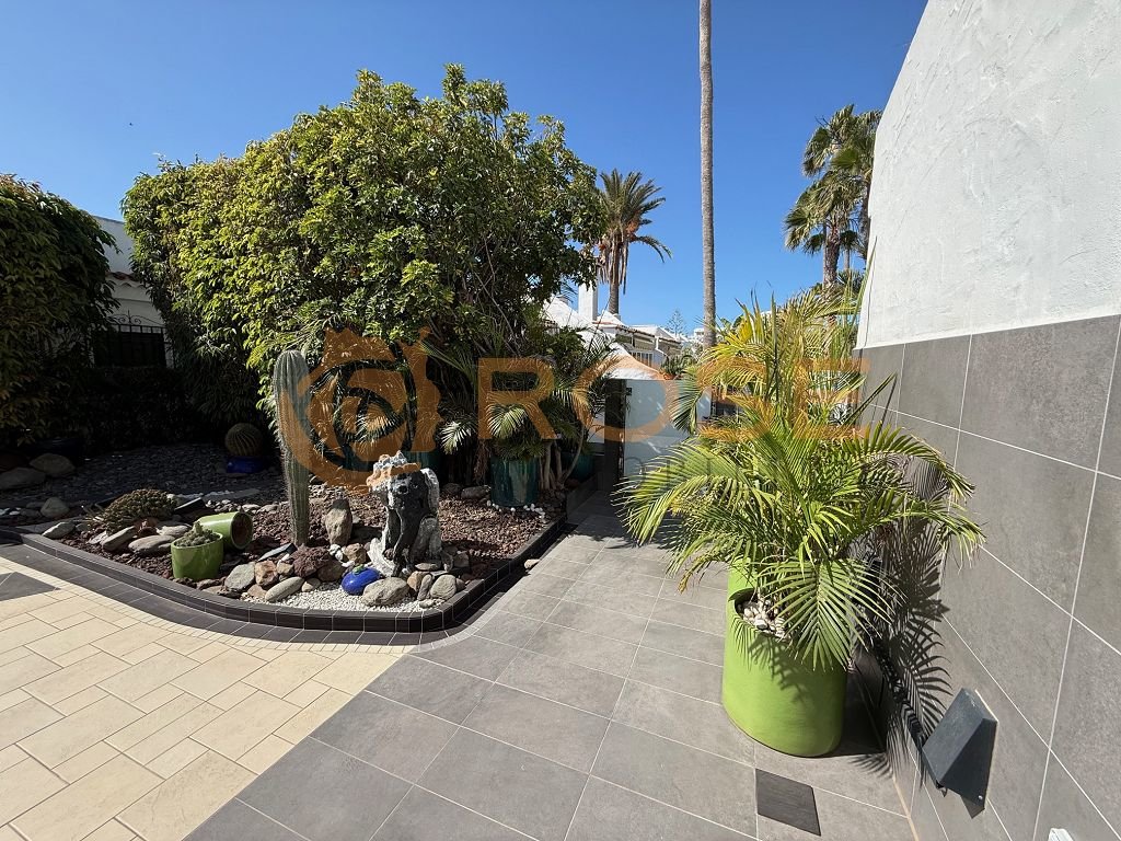 Terrace area with high-quality surface design and integrated greenery