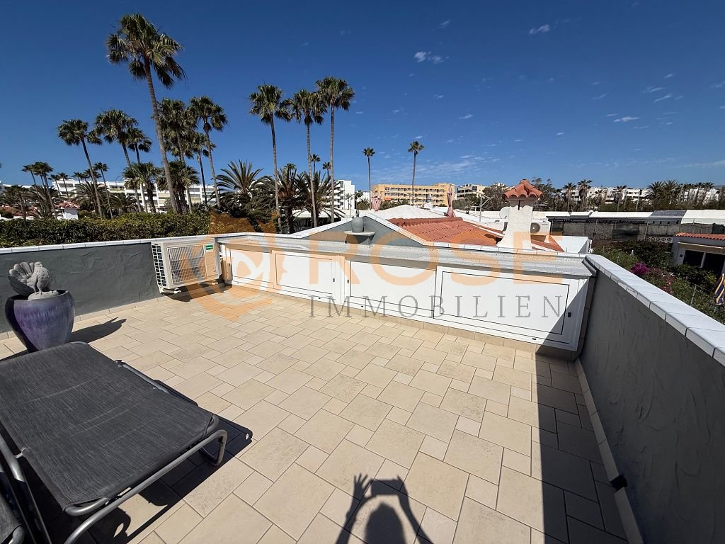 Roof terrace with panoramic view and high-quality natural stone coverings