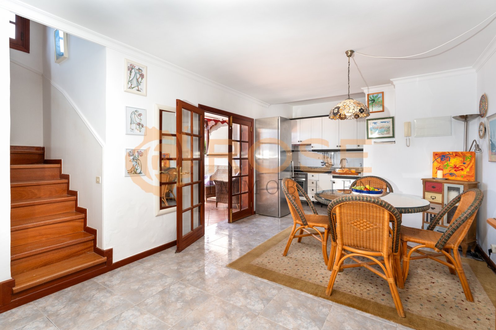 Open kitchen-living area with seamless space connection and practical functionality