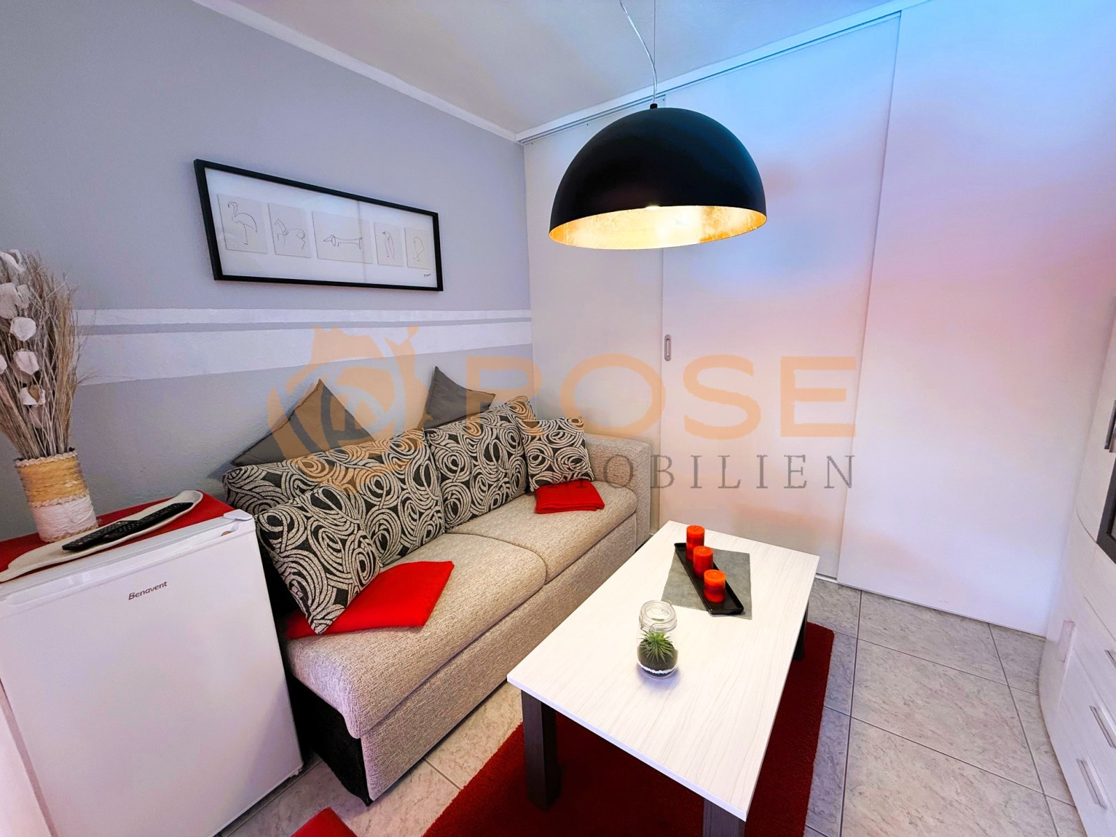 Compact living room with optimal space utilization and modern ceiling design