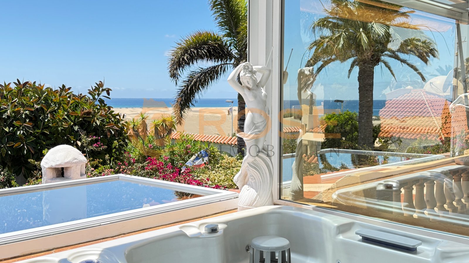 Luxury bathroom with panoramic sea view – wellness experience with open horizon