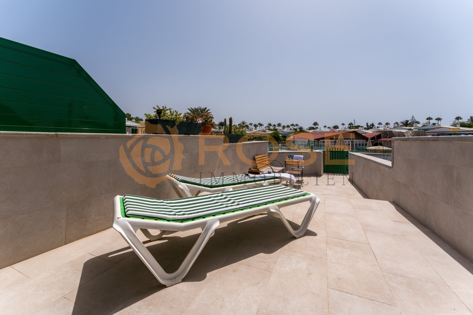 Sun terrace with comprehensive privacy screening and large lounging areas Sun terrace with comprehensive privacy screening and large lounging areas