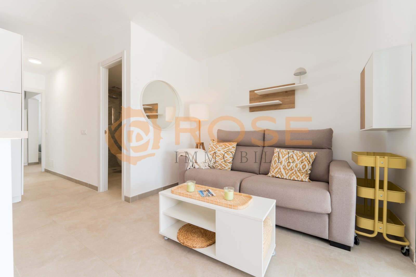Bright living room with open layout and direct access to the kitchen Bright living room with open layout and direct access to the kitchen