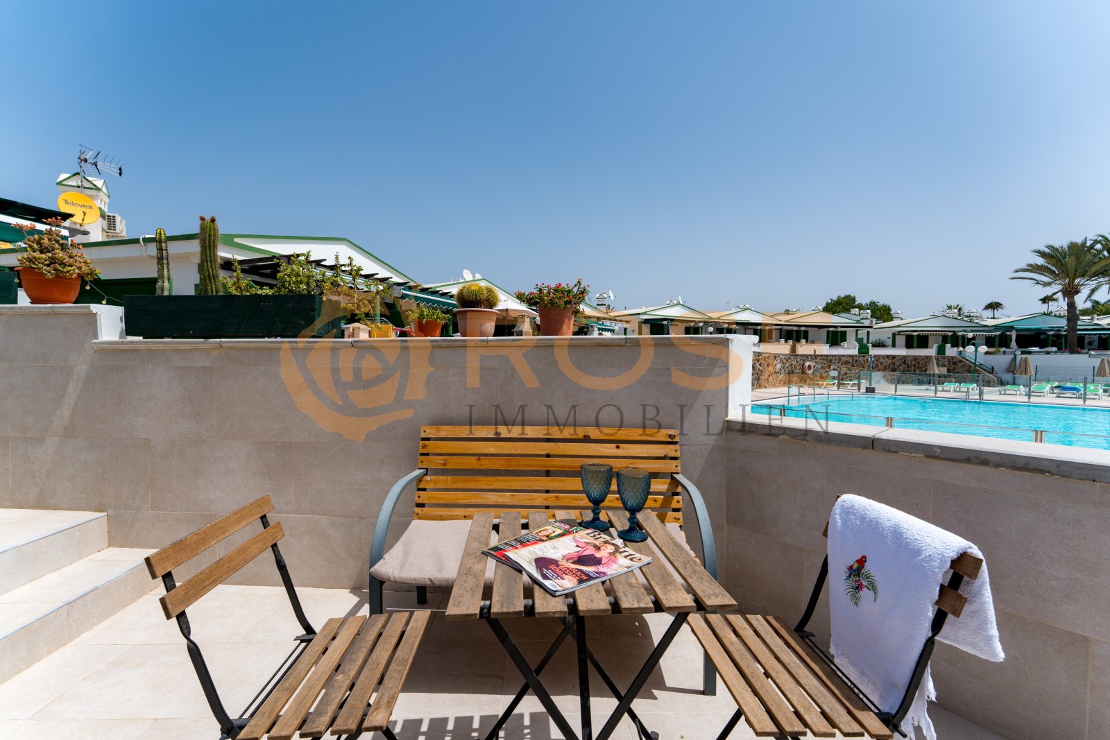 Private rooftop terrace with direct pool view and high-quality balustrade system Private rooftop terrace with direct pool view and high-quality balustrade system