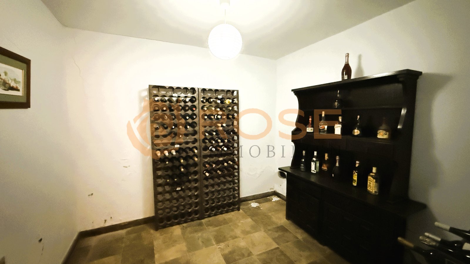Wine cellar with professional storage technology and display areas