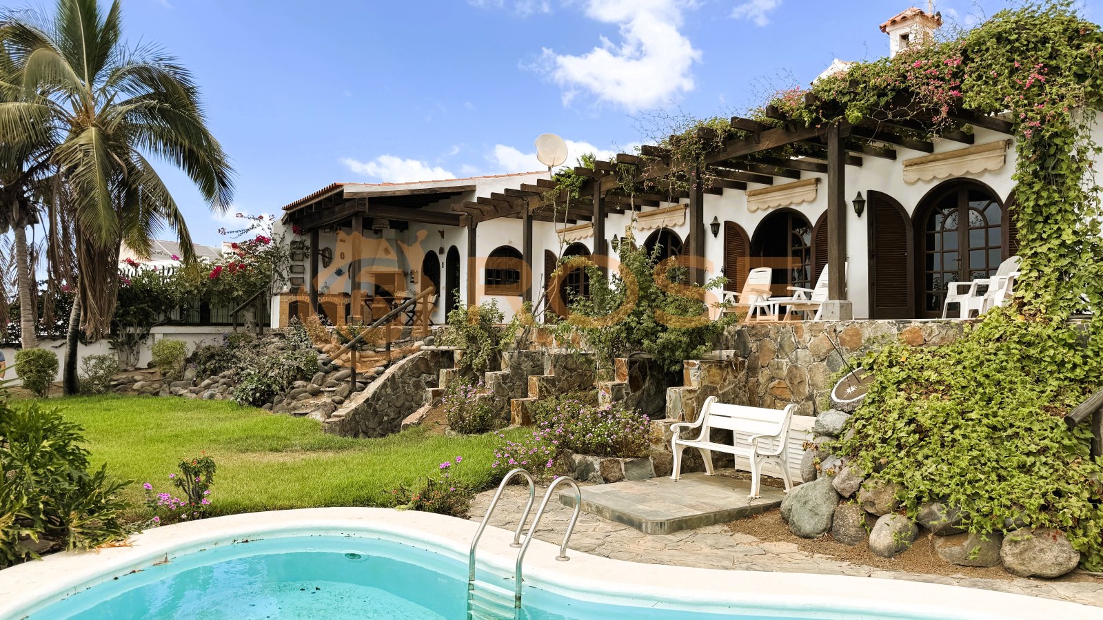 Pool facility with multi-level terrace architecture and harmonious garden connection